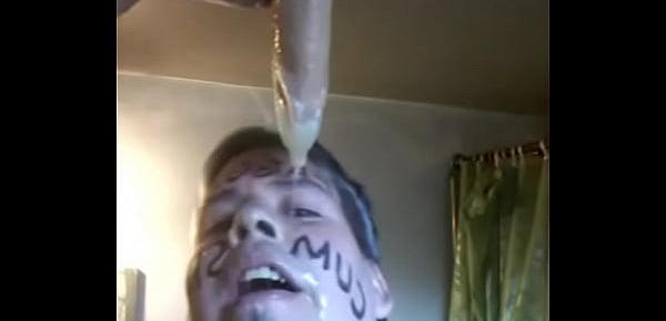  Faggot dripping with loads of cum from a condom